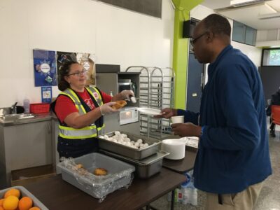 woman serving food