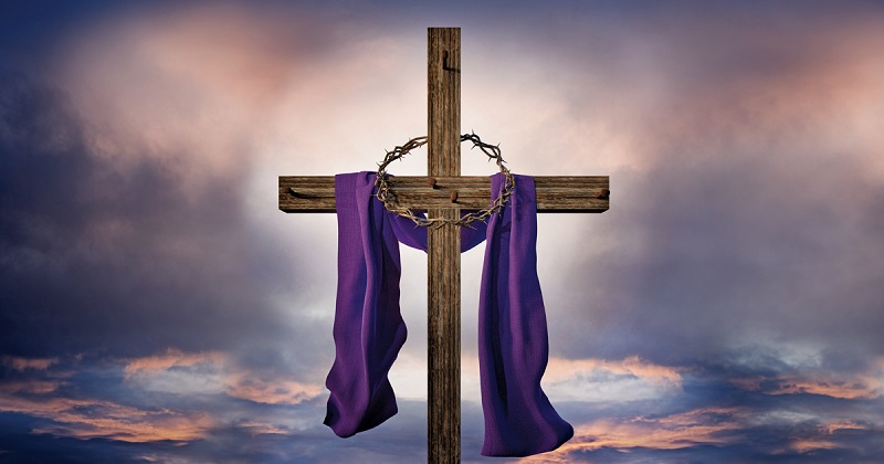 cross draped with purple robe and crown of thorns