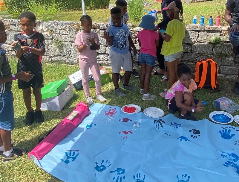 Youth hand painting at camp