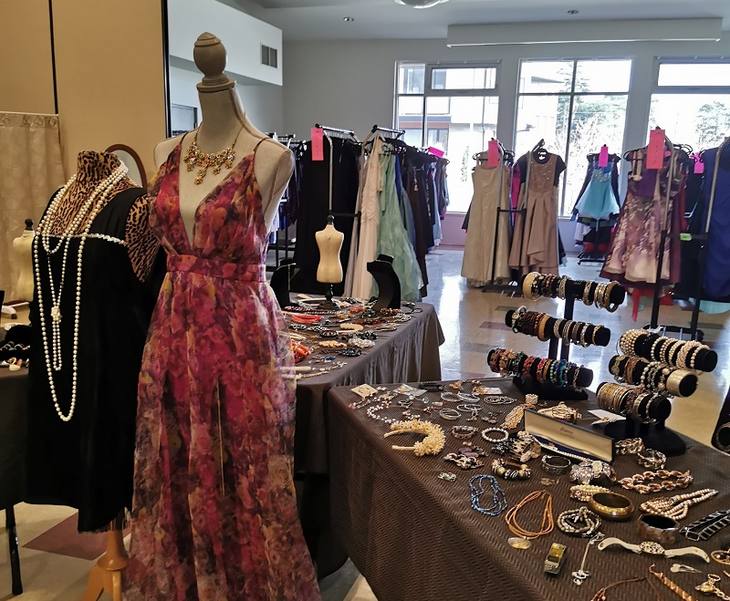 A room filled with prom dresses and accessories