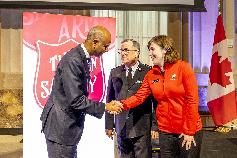 Commissioner Floyd Tidd and Amy Fisher, housing consultant, social mission department, greet the Honourable Ahmed Hussen, minister of housing and diversity and inclusion