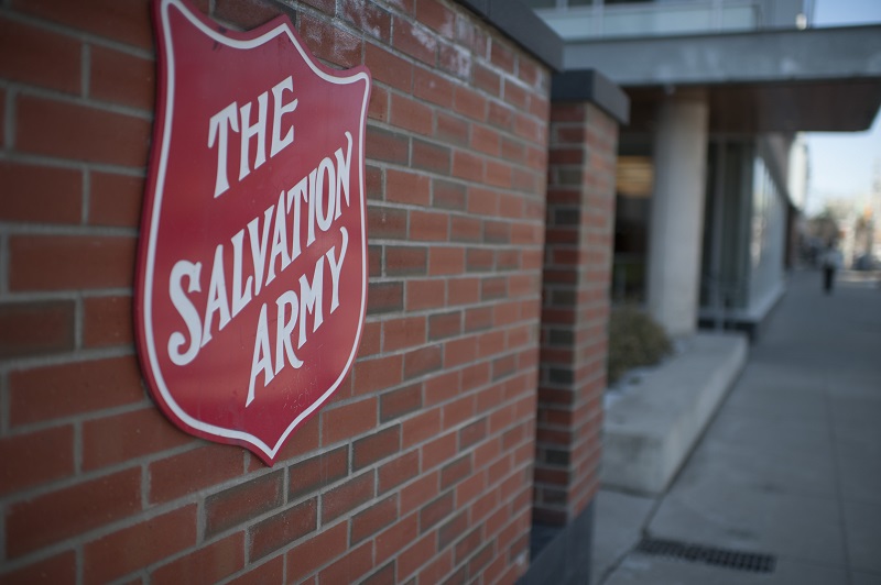 Salvation Army shield on brick building