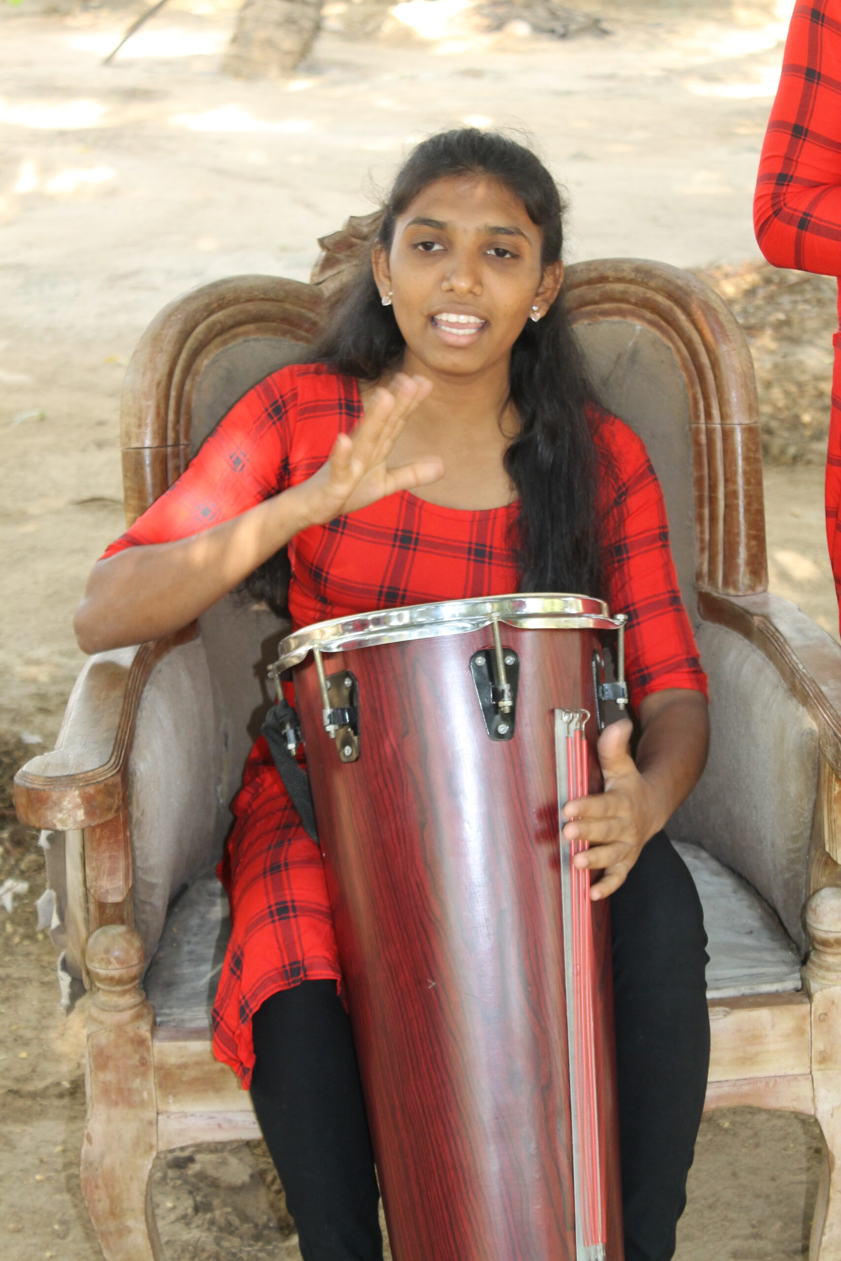 Thivya playing instrument