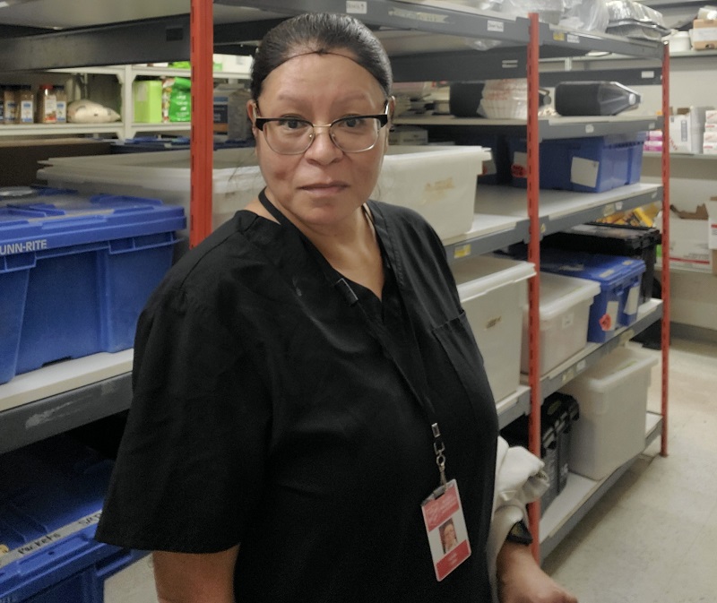 Vonda with kitchen supplies in background