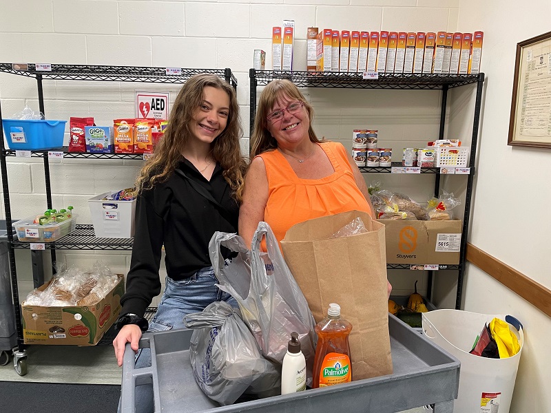 (Left) Tatianna Hann (Food Bank Assistant), (Right) Kat Collins (Client).