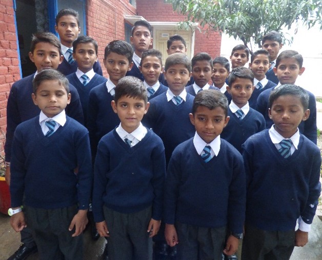 boys at a home in Pakistan