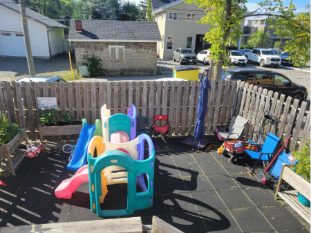 playground with chairs around it